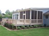 After Rear Exterior with New Screen Porch and Deck